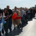 Leon in the fat suit keeps the back half of the conga entertained.