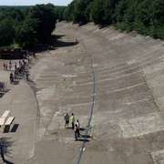 Scalextrics track is laid along the Members' Banking at the Brooklands motor racing circuit.